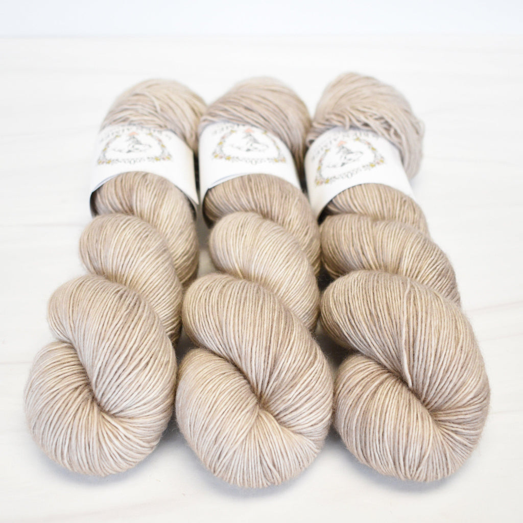 La Bien Aimee Bone Merino Singles